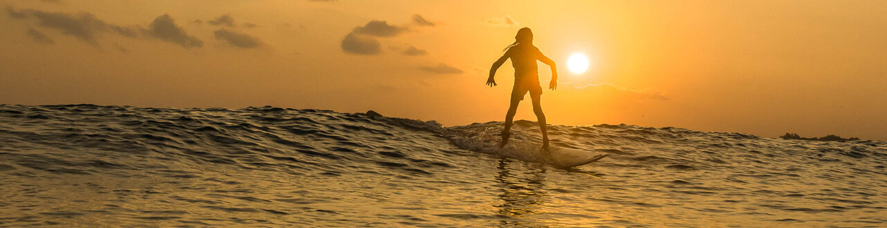 sunset surfing
